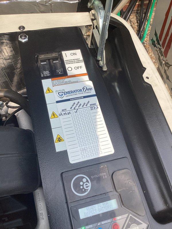 Performed scheduled maintenance on Generac generator system. Upon inspection, the Evolution controller display indicated "INSERT BATTERY" error message, confirming battery replacement required for the mobile link monitoring system. Documented maintenance tracking chart and assessed internal generator battery condition to determine if additional battery replacement needed beyond the mobile link unit.