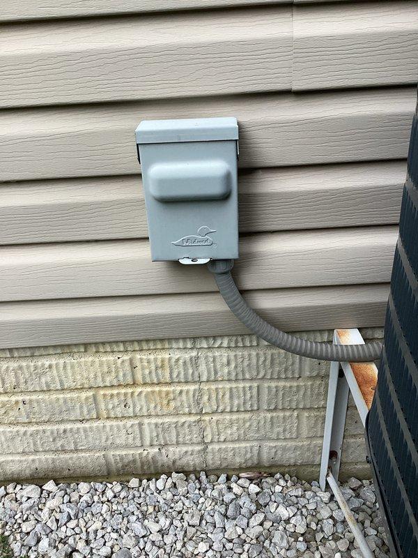 # HVAC Cooling Maintenance Summary

Completed routine seasonal cooling maintenance on residential air conditioning system as part of ongoing preventive maintenance program. Performed comprehensive inspection of outdoor condensing unit, refrigerant lines, electrical disconnect, and drainage components. All refrigerant lines inspected and found secure with existing insulation; noted typical weathering on copper piping consistent with system age. Verified proper operation of condensate drain line and confirmed electrical disconnect box functioning correctly. System tested and operating within normal parameters with no deficiencies requiring immediate attention.