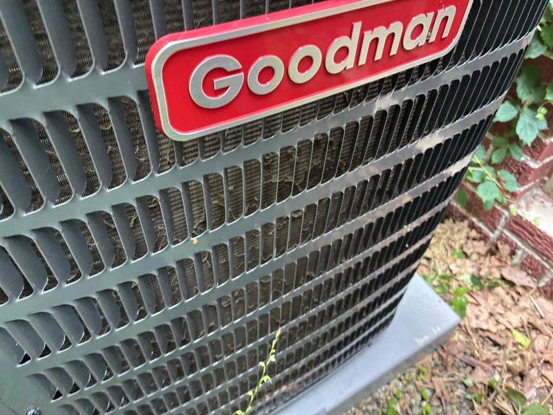 Completed scheduled cooling maintenance on Goodman outdoor condensing unit. Performed comprehensive system inspection including examination of blower wheel assembly, which showed normal dust accumulation consistent with regular operation. Verified proper airflow through exterior louvered panels and confirmed all manufacturer labeling and identification tags remain intact and legible. Unit operating within normal parameters with no immediate service needs identified.