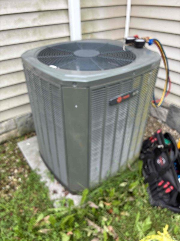 Performed preventative maintenance service on two residential AC units. Replaced air filters on both systems per customer request. Conducted electrical diagnostics using clamp meter on outdoor condenser unit, recording amperage readings of 444.4A and 242.2V to verify proper system operation. Inspected outdoor condenser unit including fan motor assembly and electrical connections. All systems operating within normal parameters upon completion of service.