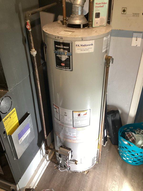 Responded to service call for Bradford White tanked water heater with pilot light repeatedly extinguishing. Upon arrival, inspected gas control valve, thermocouple, and pilot assembly for proper operation and positioning. Cleaned pilot orifice and thermocouple sensor to remove dust and debris accumulation. Tested flame sensor continuity and verified adequate millivolt signal generation. Checked gas supply pressure and confirmed proper venting with no blockages or backdraft conditions. Cycled pilot light multiple times to verify reliable ignition and flame retention. All plumbing connections, pressure relief valve, and gas line fittings inspected with no leaks detected. Unit restored to normal operation with stable pilot light and burner function confirmed.
