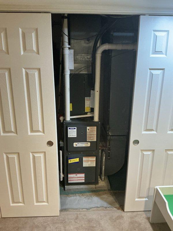 Conducted estimate for furnace replacement due to rusted heat exchanger identified during maintenance inspection. Evaluated existing basement-installed HVAC unit, documented current system configuration including ductwork and venting, and provided customer with replacement options versus repair alternatives given the compromised heat exchanger condition.