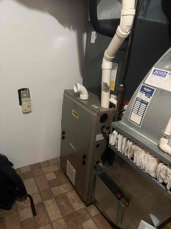 Completed scheduled preventive maintenance on residential HVAC cooling system. Performed comprehensive inspection of air handler and associated components, verified proper airflow and temperature differential across evaporator coil with supply air reading 65.3°F, checked condensate drainage system and PVC routing for proper operation, and confirmed all equipment operating within manufacturer specifications.