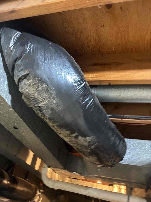 Completed scheduled preventive maintenance on dual cooling systems as part of ongoing service plan. Performed comprehensive inspection of HVAC equipment including evaluation of ductwork conditions in attic space, where flexible duct insulation showed signs of wear with outer reflective layer damage requiring documentation. Verified proper clearances and measurements of ductwork installation, confirming adequate spacing between components and structural elements. Inspected refrigerant line routing and copper piping connections for proper installation and support. All systems operational upon completion with photographic documentation of existing conditions for service records.