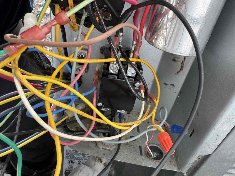 Responded to cooling emergency for 7-year-old residential air conditioning system with non-functioning condenser unit. Diagnosed failed contactor preventing compressor operation. Replaced defective contactor with new component, verified all electrical connections, and restored system to normal cooling operation.