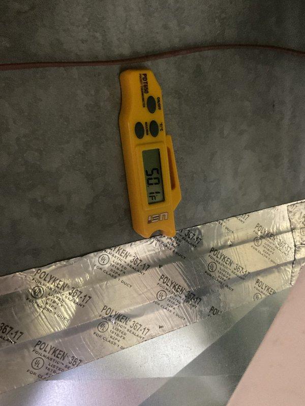 Completed routine HVAC cooling system maintenance on residential furnace unit with integrated cooling components. Performed standard inspection procedures, verified proper airflow with supply temperature reading of 51°F, and confirmed all safety labels and ventilation piping connections were intact and functioning correctly.
