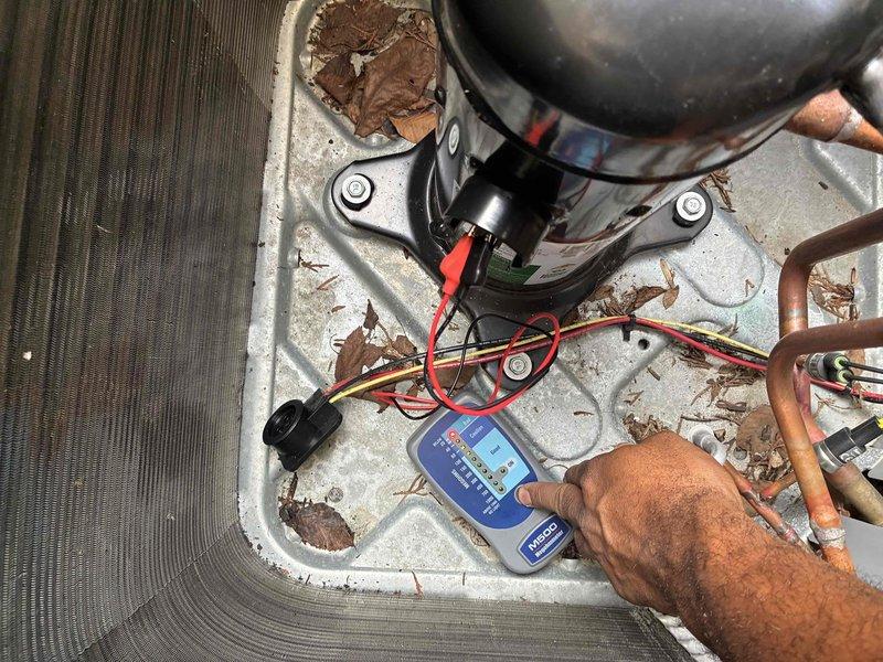 Responded to no cooling complaint on residential air conditioning system. Performed diagnostic testing on outdoor condensing unit using digital multimeters to measure electrical values at compressor and associated components. Evaluated compressor operation, refrigerant line connections, and internal wiring. Identified system malfunction through systematic electrical troubleshooting procedures.