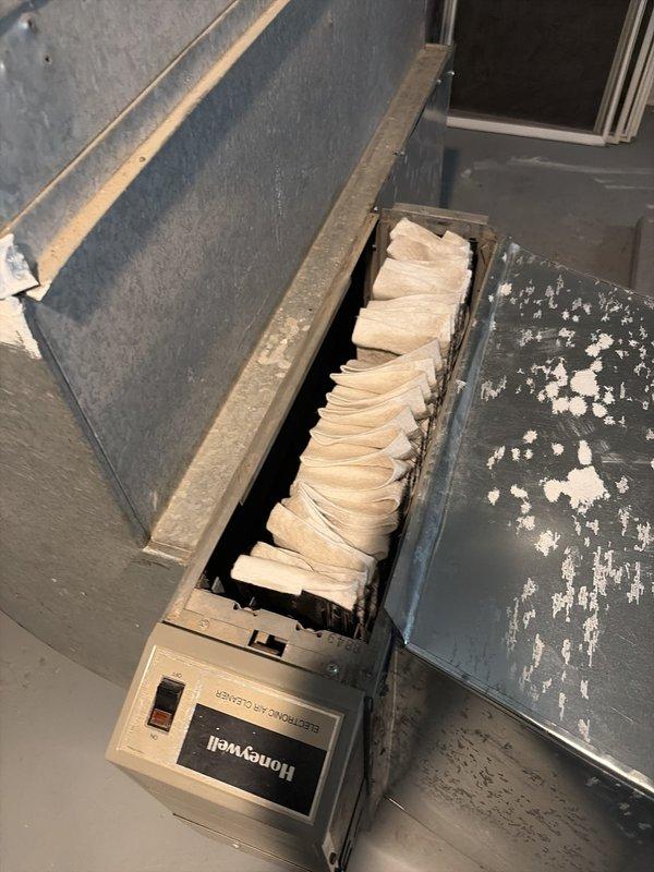 Completed scheduled preventive maintenance on commercial HVAC cooling system. Inspected air handling unit and filter housing assembly, verified proper filter installation and pleated media condition, and conducted temperature diagnostics using calibrated digital thermometer to confirm system operation within normal parameters.