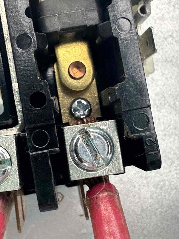 # HVAC Cooling Maintenance Service

Completed comprehensive preventive maintenance on residential air conditioning system as part of ongoing service plan. Performed thorough inspection of electrical components, including contactor assembly and terminal connections. Verified all wire terminations were secure, with particular attention to terminal block connections and contact points. Examined contactor mechanism for proper operation, checking contact surfaces and mounting hardware for wear or deterioration. All electrical connections found to be in satisfactory condition with no loose wiring or signs of overheating. System components photographed for service documentation purposes.