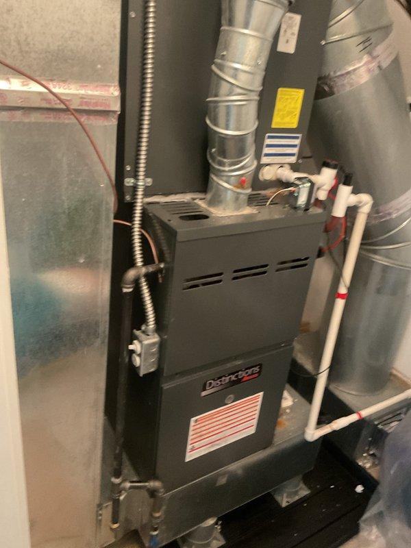 Completed preventive maintenance on two HVAC cooling systems. Performed comprehensive inspection of both units, including temperature measurements using calibrated infrared thermometer to verify proper system operation and airflow temperatures. Inspected furnace units, ductwork connections, condensate drainage lines, and electrical components. All systems found operating within normal parameters with no deficiencies noted.