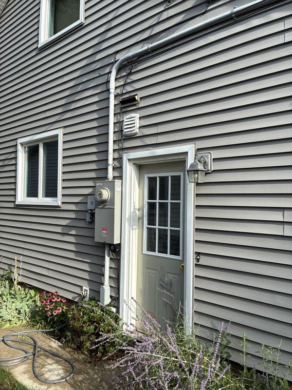 Conducted comprehensive diagnostic evaluation of existing HVAC system and presented full replacement options to homeowner. Assessed current equipment condition including furnace, air conditioning unit, and associated ductwork in basement mechanical space. Reviewed system accessibility, utility connections, and exterior condenser placement. Documented existing installation configuration including plumbing interfaces, electrical service panel proximity, and ventilation routing through foundation wall for replacement planning purposes.