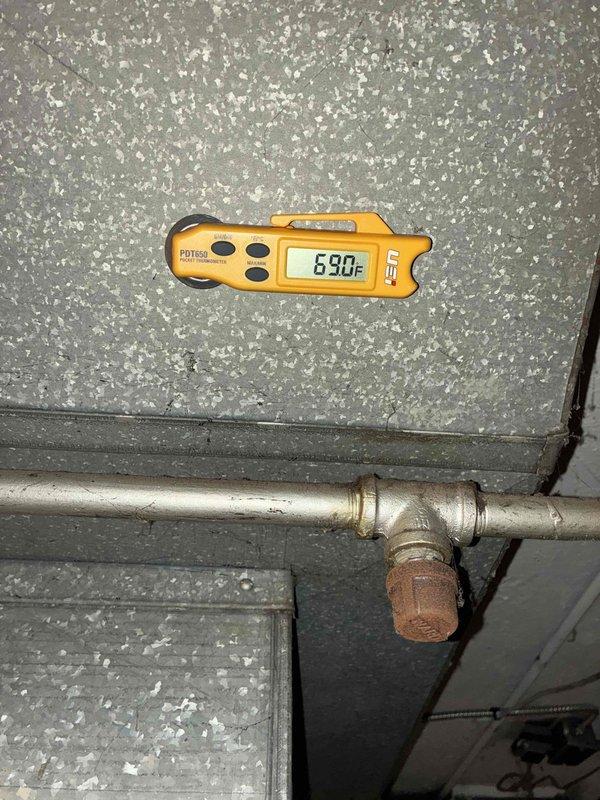Completed scheduled cooling maintenance visit on residential HVAC system. Performed comprehensive inspection of outdoor condensing unit, verified electrical disconnect operation and fuse status, checked refrigerant line temperatures recording 69.0°F on suction line, and documented system conditions. All components found operating within normal parameters with no immediate repairs required at time of service.