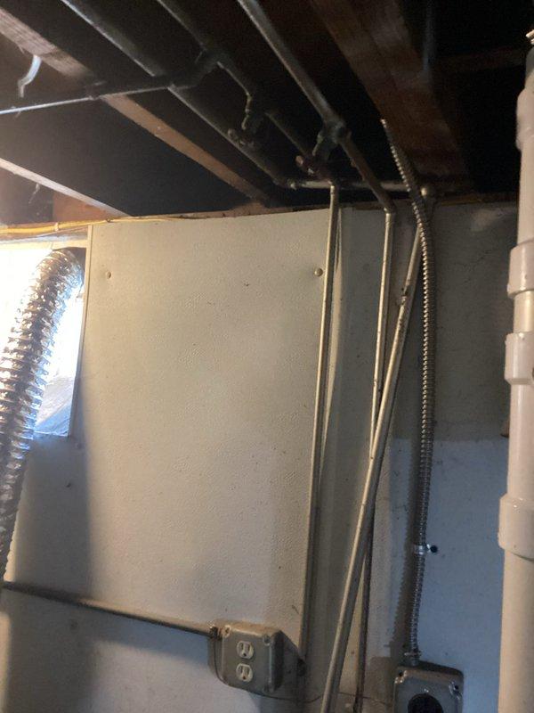 Completed main stack replacement in mechanical room. Removed existing deteriorated cast iron or galvanized stack piping and installed new plumbing stack system with proper venting. Work included accessing the main waste line through the basement utility area, ensuring proper pitch and connections, and securing all new piping to building structure per code requirements.