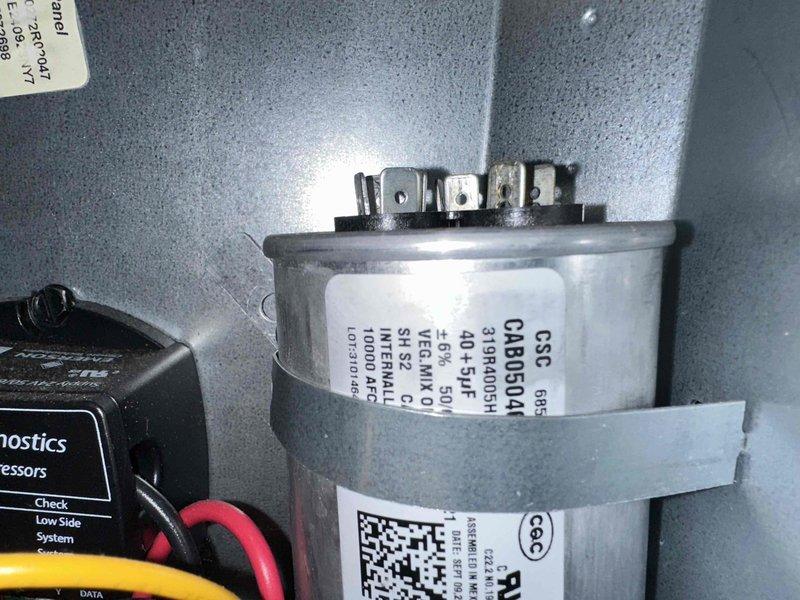 Completed comprehensive cooling system maintenance on residential HVAC unit. Performed diagnostic testing of dual-run capacitor (40+5 MF, 370V rating) using specialized testing equipment to verify proper electrical function and capacity retention. Inspected furnace blower assembly, heat exchanger components, control board connections, and all associated wiring for wear or damage. All system components found to be operating within manufacturer specifications with no deficiencies noted.