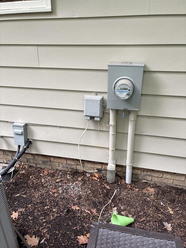 Conducted on-site evaluation for generator installation at residential property. Assessed existing electrical service infrastructure, including 240V single-phase meter configuration and current service panel setup. Documented electrical meter specifications, conduit routing, and available connection points to determine generator integration requirements and provide comprehensive estimate for backup power system installation.