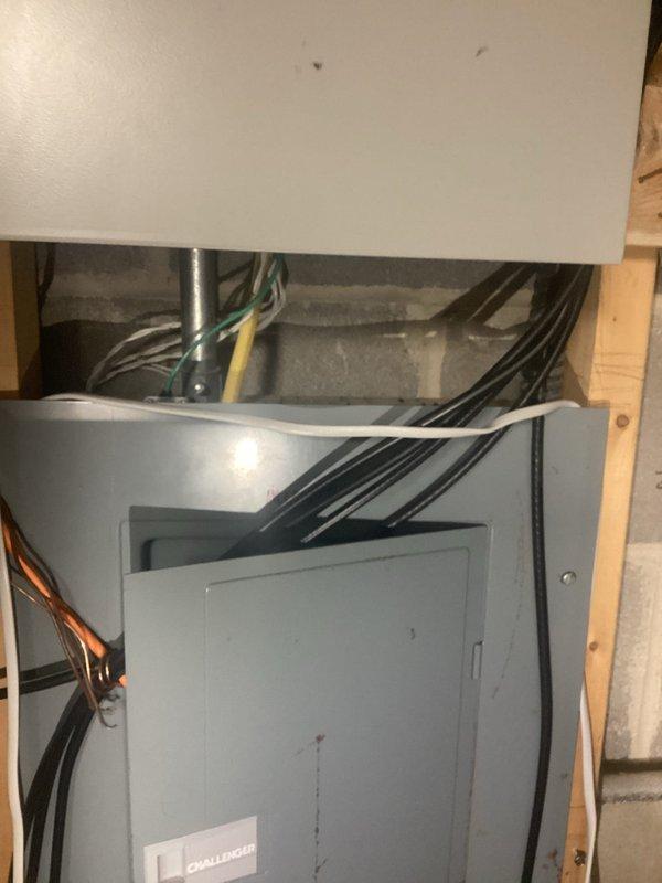Installed whole house surge protection system at main electrical panel. Mounted surge protection device to electrical panel, connected to main service conductors, and verified proper grounding and installation per manufacturer specifications and NEC requirements to protect household electrical systems and appliances from voltage spikes and power surges.
