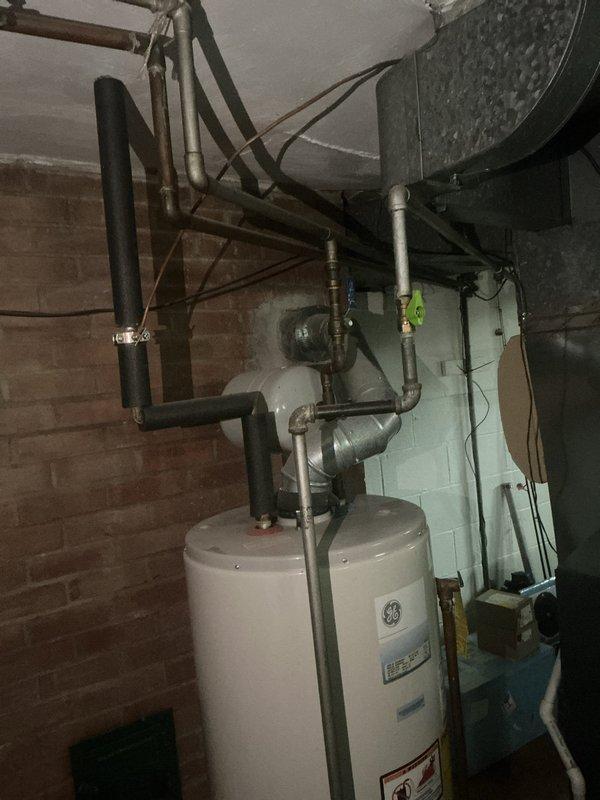 Conducted on-site evaluation for electrical panel and main service replacement in residential basement utility area. Assessed existing electrical infrastructure, including current panel location, service entrance conductors, and grounding system. Documented existing conditions through photographic survey to develop comprehensive replacement estimate for upgrading main electrical service and distribution panel to meet current code requirements and customer capacity needs.