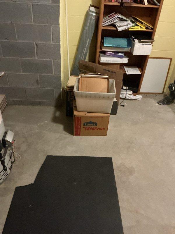 Conducted on-site assessment of existing water heater installation in basement utility area to provide replacement estimate. Inspected current hot water heater unit, noting manufacturer specifications, installation configuration, and existing plumbing connections. Documented equipment condition and surrounding workspace access for accurate replacement planning and material requirements.
