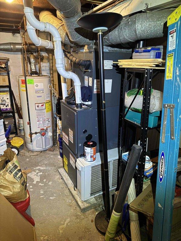 Completed scheduled cooling system maintenance on residential HVAC unit located in basement mechanical room. Performed comprehensive inspection of furnace and cooling components, including blower motor, electrical connections, and capacitor. Verified proper operation of all system components, checked wiring harnesses and control circuits, and documented equipment condition through photographic records for maintenance history.