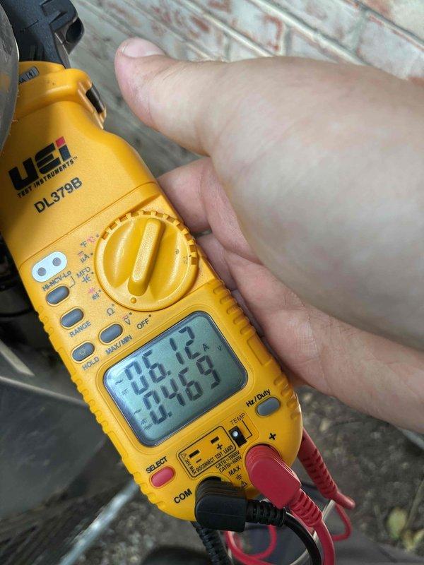 Completed routine cooling system maintenance as part of recurring service plan. Inspected electrical components within air handler cabinet, including capacitor and wiring connections at terminal blocks. Verified system electrical readings using digital multimeter to ensure proper voltage and amperage levels across all circuits.