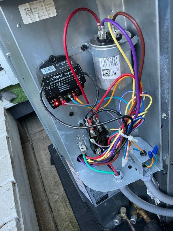 Completed routine cooling maintenance on residential HVAC system. Inspected and verified proper operation of CoreSense Digital control module, capacitor connections, and all electrical wiring throughout both outdoor condensing unit and indoor air handler. All components tested within normal operating parameters, system cycling properly with no issues detected.