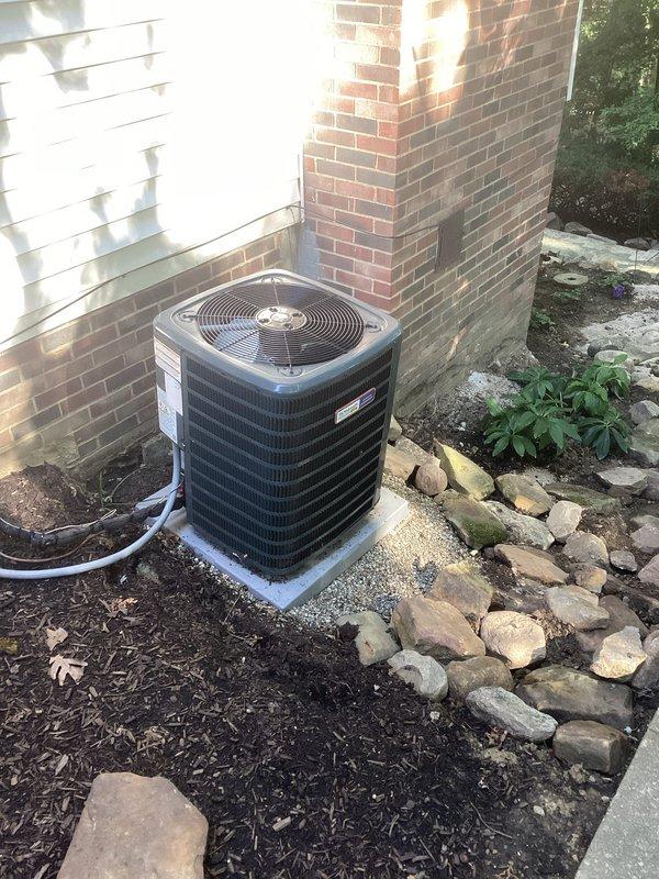 Completed comprehensive cooling system maintenance on residential outdoor condenser unit. Upon arrival, inspected AC unit positioning in response to concern about unit leaning following previous uninstallation and reinstallation. Verified unit placement on concrete pad, confirmed level positioning, and assessed structural stability of installation. Unit found to be properly seated on pad with adequate clearance from building structure for optimal airflow. Performed standard preventive maintenance procedures including visual inspection of condenser housing, fan grille assembly, refrigerant line connections, and electrical conduit. Confirmed proper drainage line routing and verified landscaping clearances around unit perimeter remain adequate for system performance. All components operating within normal parameters with no immediate concerns identified regarding unit stability or positioning.