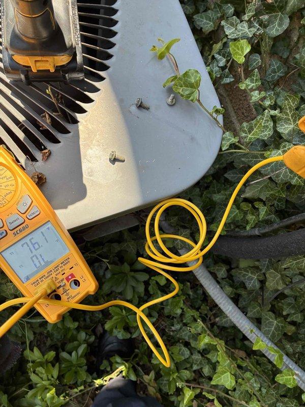 Responded to no cooling complaint on 15-year-old residential air conditioning system where fan was running but unit was not producing cold air. Upon arrival, performed electrical diagnostics on outdoor condenser unit using digital multimeter to test voltage and amperage at compressor. Testing revealed compressor failure, preventing refrigerant compression and heat transfer necessary for cooling operation. Explained findings to homeowner and provided options for repair versus replacement given age of equipment.
