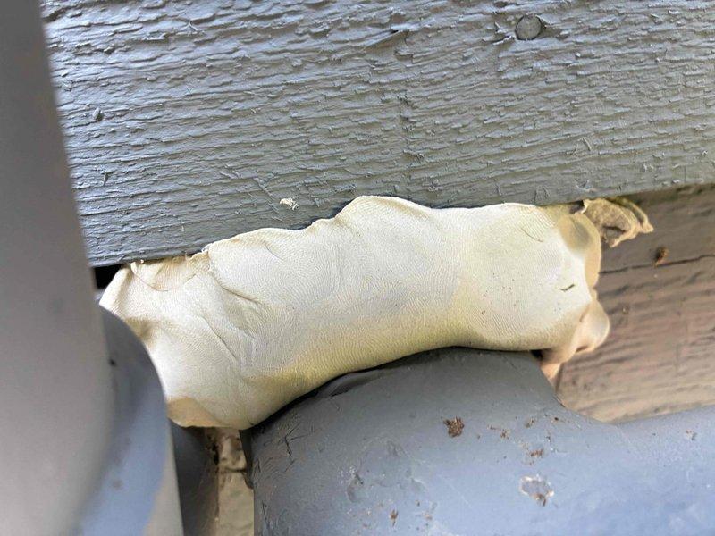 Responded to service call regarding rodent intrusion at outdoor HVAC unit installed in 2020. Upon inspection, discovered damaged insulation around exterior unit with visible deterioration and debris scattered on window sill area. Identified gaps and openings where rodents were accessing equipment and potentially compromising wiring integrity. Inspected copper refrigerant line connections and exterior piping for damage caused by pest activity. Applied expanding foam insulation to seal entry points at pipe penetrations and gaps in building envelope where unit connects to structure. Secured vulnerable areas around lineset and electrical connections to prevent further rodent access and protect system components from wildlife damage.