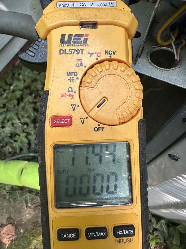 # HVAC Cooling Maintenance Summary

Performed comprehensive preventive maintenance on residential air conditioning system as part of ongoing service agreement. Conducted thorough inspection of outdoor condensing unit, verifying proper electrical specifications and manufacturer ratings on equipment nameplate. Utilized digital multimeter to measure and document electrical parameters, confirming system operating within acceptable voltage and amperage tolerances. Unit showed normal weathering consistent with outdoor installation, with no significant operational concerns identified during inspection.