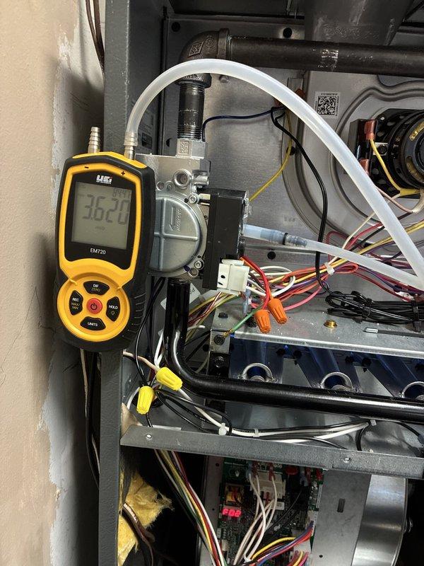 Completed full HVAC system installation including 80% efficiency furnace, air conditioning unit, and air scrubber. All equipment installed per manufacturer specifications, electrical connections verified, gas line pressures tested and confirmed within acceptable range at 362.0 reading, condensate drainage properly routed, and system commissioned with successful operational testing of all components.