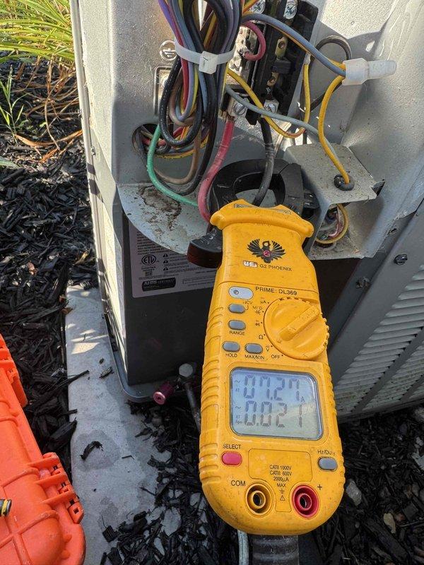 Completed comprehensive cooling system maintenance on outdoor HVAC unit. Performed electrical system inspection and testing, verifying voltage readings of 232V and frequency of 60.2Hz using digital multimeter to ensure proper power supply to unit. All electrical connections, wiring, and components were inspected and found to be functioning within normal operating parameters.