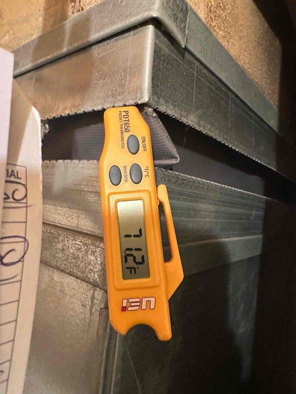 Completed comprehensive cooling maintenance on aging HVAC system requiring elevated access with ladder and two-technician safety protocol. Performed temperature diagnostics using digital measurement equipment on ductwork and inspected electrical connections and mounting components of air handler unit, documenting system condition with photographic records per MVP maintenance standards.
