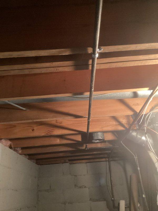 Responded to warranty callback following failed inspection due to loose piping from original installation. Secured and properly fastened all HVAC refrigerant lines and ductwork in basement/crawl space area using appropriate mounting brackets and clamps to meet code requirements. Verified all connections were tight and properly supported to ensure system integrity for home sale inspection approval.