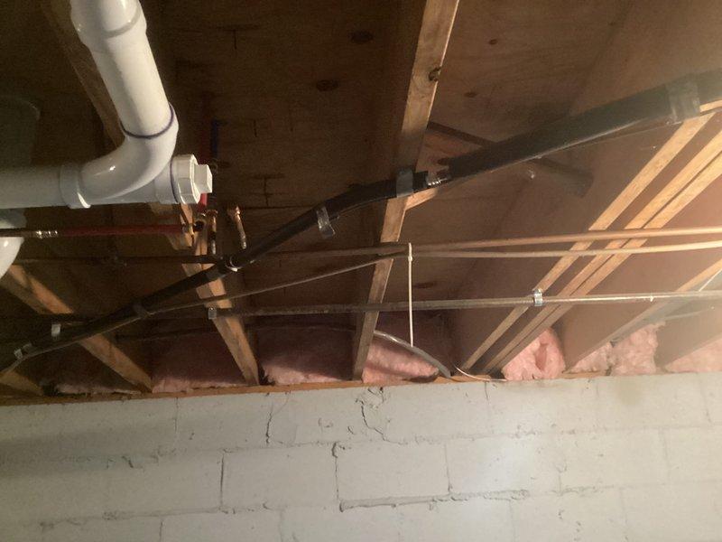 Responded to warranty callback following failed inspection due to loose piping from original installation. Secured and properly fastened all HVAC refrigerant lines and ductwork in basement/crawl space area using appropriate mounting brackets and clamps to meet code requirements. Verified all connections were tight and properly supported to ensure system integrity for home sale inspection approval.