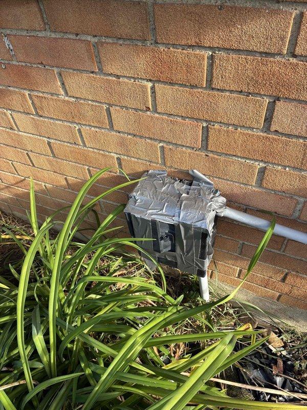 Completed scheduled preventive maintenance inspection on residential cooling system. Inspected condenser coil fins for proper alignment and cleanliness, verified heat exchanger components showing good condition with no visible debris accumulation or deterioration. Examined exterior condensing unit and electrical connections, noting weatherproofing measures in place on utility disconnect box.