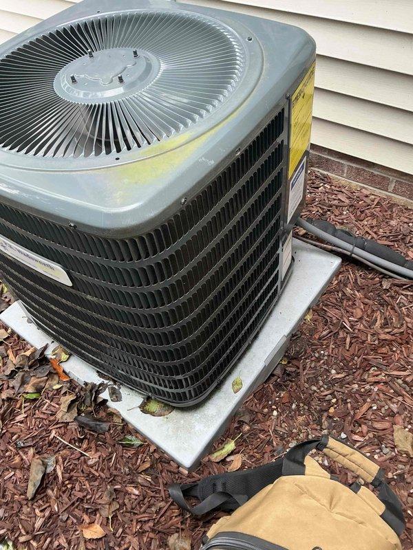 Completed scheduled preventive maintenance on residential cooling system including outdoor condenser unit and indoor air handler. Performed comprehensive inspection of American Standard HVAC equipment, verified proper operation of condenser fan and compressor, checked refrigerant levels, and inspected heat exchanger coils for adequate airflow. Cleaned debris and organic material from condenser pad area, examined all electrical connections, and confirmed system is operating within normal parameters for continued reliable cooling performance.