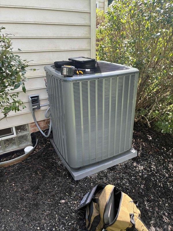 Completed routine cooling maintenance on residential air conditioning system. Performed comprehensive inspection of outdoor condenser unit, verified proper operation of compressor assembly, checked electrical connections and capacitor functionality, and confirmed CoreSense diagnostic monitoring system was operating correctly. All components found in good working condition with no issues identified.