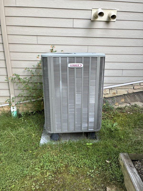 Completed scheduled preventive maintenance on Lennox residential cooling system. Performed electrical diagnostics using clamp meter, recording amperage draw of 0.31A on condenser unit. Inspected outdoor condenser unit, verified proper operation, checked refrigerant lines, and confirmed system functionality with no issues identified.