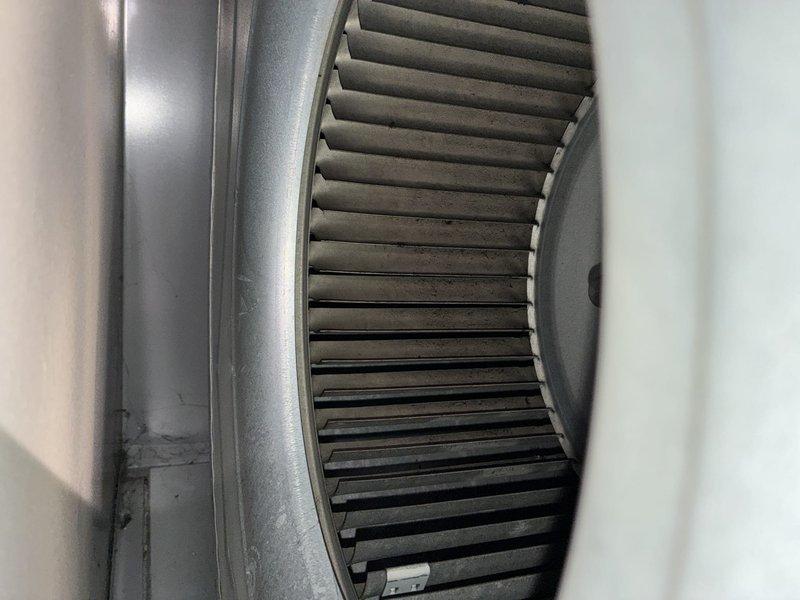 Completed preventive maintenance service on residential HVAC cooling system. Inspected air handler unit and blower assembly, noting moderate dust accumulation on squirrel cage fan blades that was cleaned to restore optimal airflow efficiency. Verified all mechanical components, ductwork connections, and system operations are functioning properly for continued reliable cooling performance.
