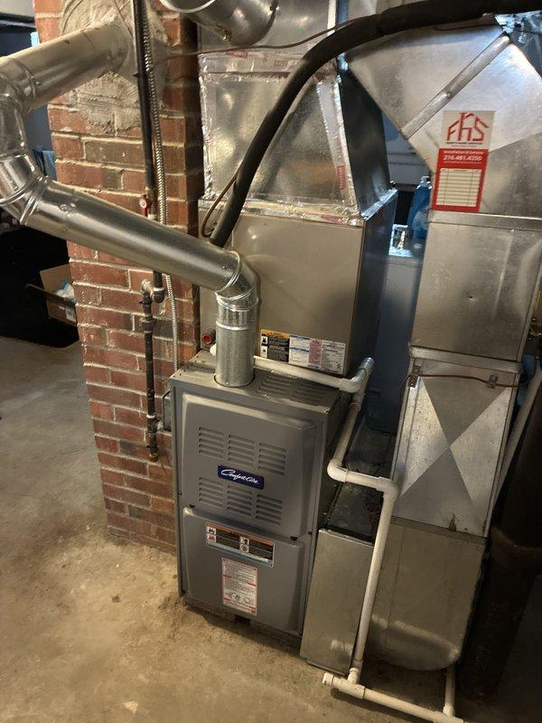 Completed preventive maintenance service on residential HVAC cooling system. Inspected air handler unit and blower assembly, noting moderate dust accumulation on squirrel cage fan blades that was cleaned to restore optimal airflow efficiency. Verified all mechanical components, ductwork connections, and system operations are functioning properly for continued reliable cooling performance.