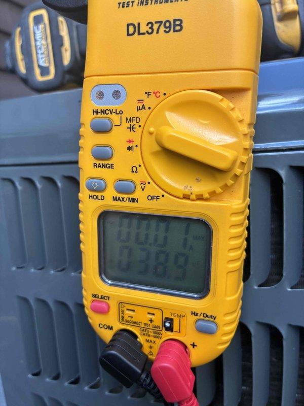 Returned to complete previously interrupted cooling system maintenance after padlock was removed from outdoor disconnect by property owner. Performed comprehensive maintenance inspection of outdoor condenser unit including electrical testing with digital multimeter, verified proper system operation, and documented equipment condition with diagnostic readings.
