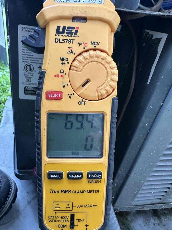 Completed scheduled cooling system maintenance visit as part of ongoing preventive maintenance program. Performed comprehensive inspection of HVAC unit including electrical measurements using clamp meter, verified blower motor operation and wiring connections, and inspected internal components including control board, heat exchanger, and burner assembly. Customer's payment method on file requires updating for future service visits.