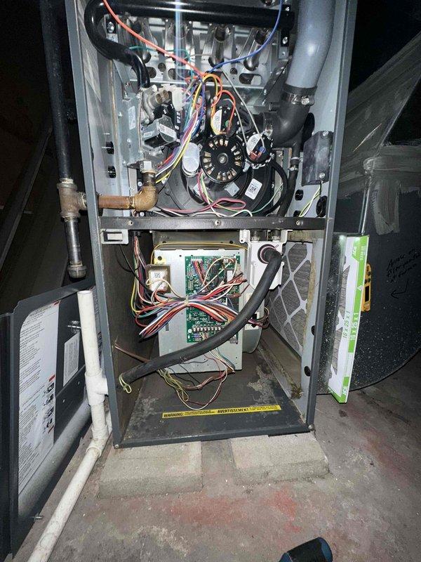 Completed scheduled cooling system maintenance visit as part of ongoing preventive maintenance program. Performed comprehensive inspection of HVAC unit including electrical measurements using clamp meter, verified blower motor operation and wiring connections, and inspected internal components including control board, heat exchanger, and burner assembly. Customer's payment method on file requires updating for future service visits.