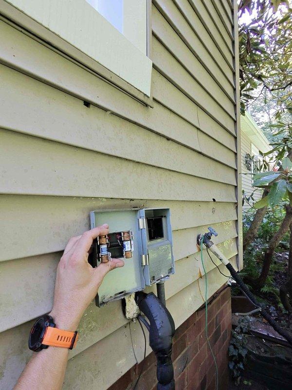 Completed comprehensive cooling system tune-up on residential HVAC unit. Performed electrical diagnostics using multimeter to verify proper voltage and amperage at disconnect box and air handler, inspected all internal components and wiring connections, and confirmed system operational parameters within manufacturer specifications.