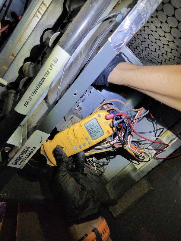 Completed comprehensive cooling system tune-up on residential HVAC unit. Performed electrical diagnostics using multimeter to verify proper voltage and amperage at disconnect box and air handler, inspected all internal components and wiring connections, and confirmed system operational parameters within manufacturer specifications.