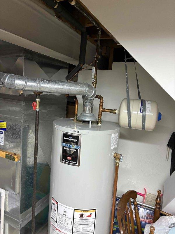 Responded to service call for non-functioning tanked water heater in residential property. Upon inspection, diagnosed failed gas control valve assembly preventing pilot ignition and burner operation. Replaced defective gas control valve, tested all safety components including thermocouple and thermal cutoff switch, and verified proper venting and combustion air supply. Restored hot water heater to full operational status with proper temperature settings and confirmed adequate hot water delivery throughout home.