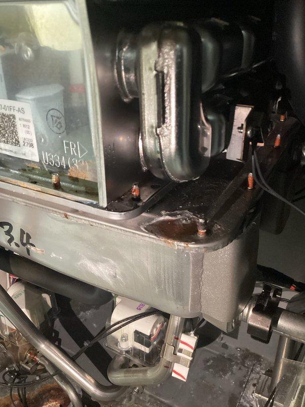 Responded to service call for tankless water heater system that would not power on despite customer attempts to reset and unplug the unit. Upon inspection, discovered significant corrosion and rust damage to the drain pan and internal components, along with evidence of water staining and moisture exposure throughout the system. Performed diagnostic evaluation of electrical connections, wiring, and mechanical components to identify the root cause of the power failure and assessed the overall condition of the unit for necessary repairs or replacement recommendations.