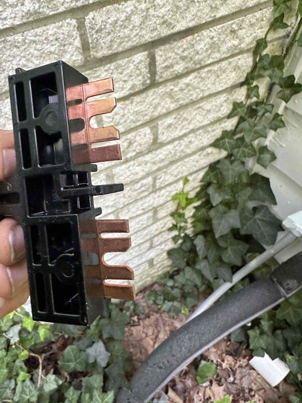 # HVAC Cooling Maintenance - Two Systems

Completed scheduled preventive maintenance on two residential cooling systems. During inspection, identified a failed dual-run capacitor exhibiting severe corrosion and terminal degradation on one unit. Replaced defective capacitor with new OEM component, restoring proper compressor and condenser fan motor operation. Verified electrical connections, tested system startup and operation, and confirmed proper cooling cycle functionality on both units.