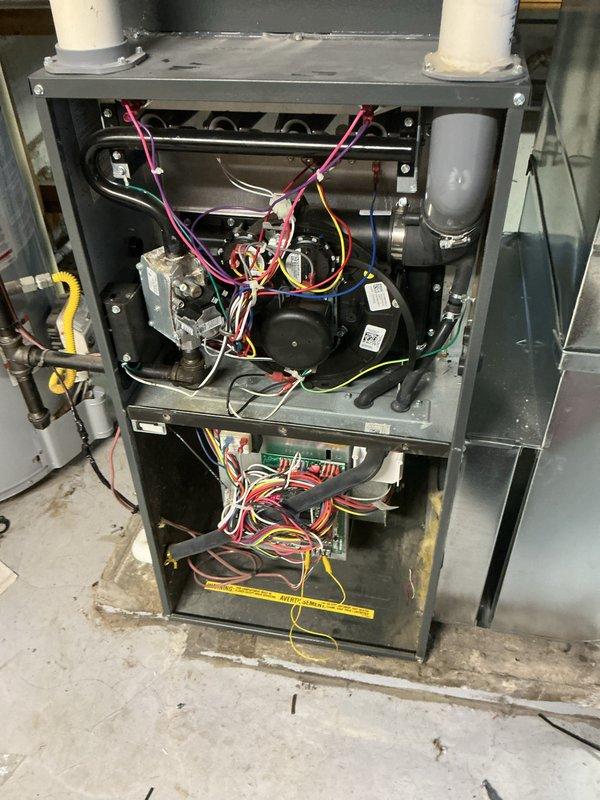 Completed comprehensive cooling maintenance on residential HVAC system as part of ongoing preventive maintenance program. Performed thorough inspection of furnace unit including gas valve assembly, draft inducer motor, electrical connections, and control board components. Verified proper operation of air return vent and filter system, confirmed all wiring connections secure, and ensured PVC vent pipes properly installed and functioning. System operating within normal parameters with no issues identified.