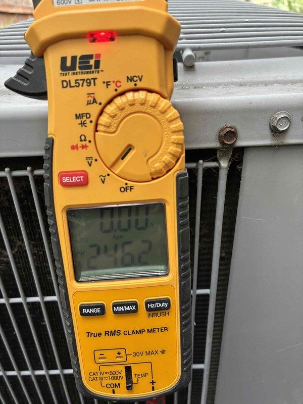 Completed scheduled preventive maintenance on aging cooling system as part of recurring service agreement. Performed comprehensive inspection of outdoor condenser unit, verifying proper operation of all components. Condenser coil found in clean condition with minimal debris accumulation. Measured and recorded system voltage at 24.62 volts, confirming proper control circuit operation. All protective grilles and housing panels intact and secure. Unit operating within normal parameters with no immediate repairs required at time of service.